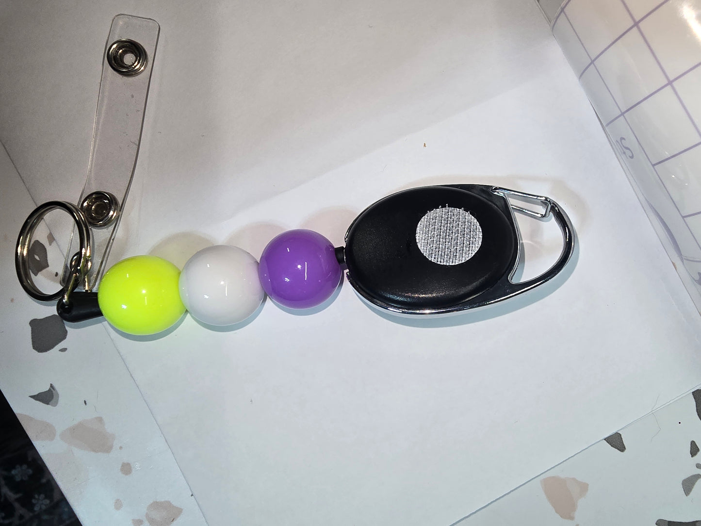 Badge Reel - purple, white and neon yellow